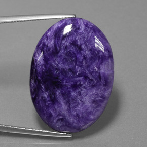 Caroite naturale viola da 27,61 ct, taglio ovale, opaco