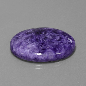 Caroite naturale viola da 27,61 ct, taglio ovale, opaco