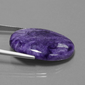 Caroite naturale viola da 26,43 ct, taglio ovale, opaco