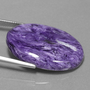 Caroite naturale viola da 30,97 ct, taglio ovale, opaco