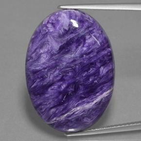 Caroite naturale viola da 21,21 ct, taglio ovale, opaco