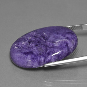 Caroite naturale viola da 30,48 ct, taglio ovale, opaco