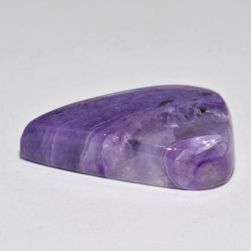 Caroite naturale viola da 21,84 ct, taglio a pera, traslucido