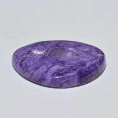 Caroite naturale viola da 9,66 ct, forma fantasia, opaco