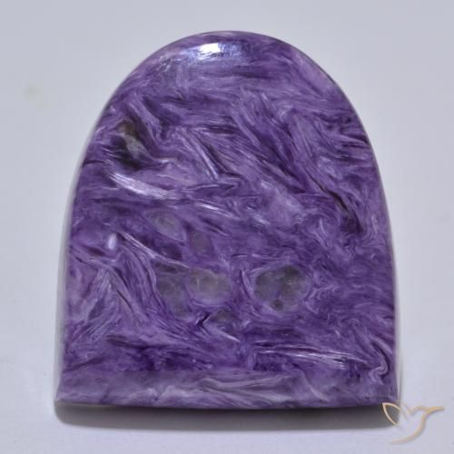 Caroite naturale viola da 30,39 ct, forma fantasia, opaco