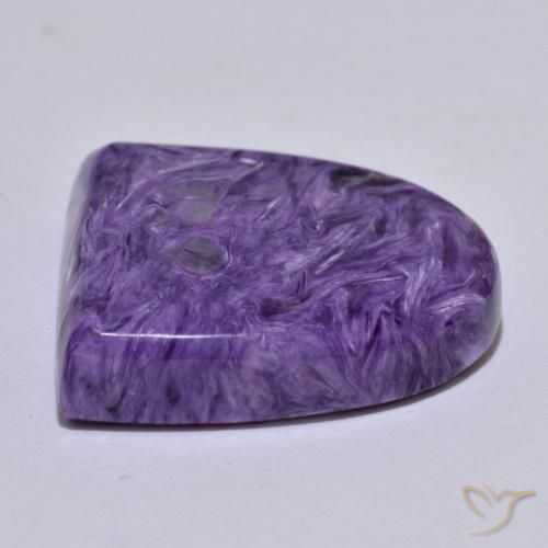 Caroite naturale viola da 30,39 ct, forma fantasia, opaco