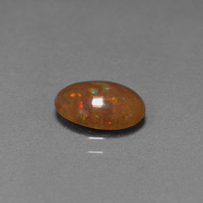 Opale cioccolato naturale multicolore da 0,83 ct, taglio ovale, opaco