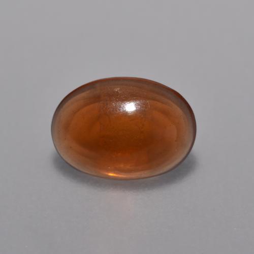 Opale cioccolato naturale arancione da 0,36 ct, taglio ovale, trasparente