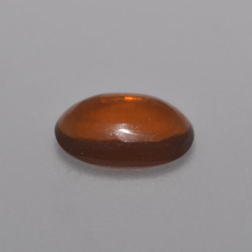 Opale cioccolato naturale arancione da 0,36 ct, taglio ovale, trasparente