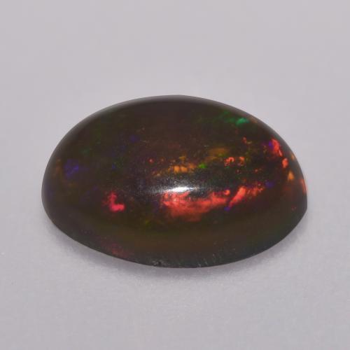 Opale cioccolato naturale multicolore da 0,67 ct, taglio ovale, traslucido