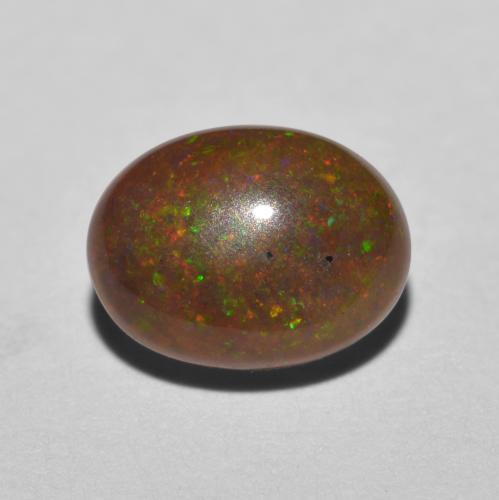 Opale cioccolato naturale multicolore da 0,85 ct, taglio ovale, traslucido