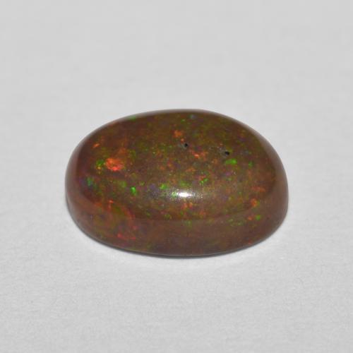 Opale cioccolato naturale multicolore da 0,85 ct, taglio ovale, traslucido