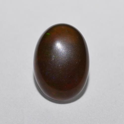 Opale cioccolato naturale multicolore da 0,52 ct, taglio ovale, traslucido