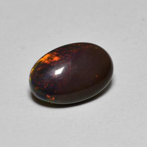 Opale cioccolato naturale multicolore da 0,80 ct, taglio ovale, traslucido