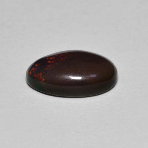 Opale cioccolato naturale multicolore da 0,80 ct, taglio ovale, traslucido
