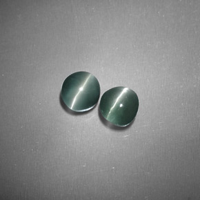 Chrysoberyl cat's eye naturale verde da  ct, taglio rotondo, traslucido