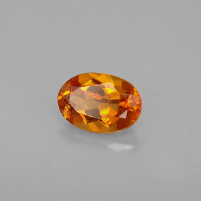 Clinoumite Giallo-arancione naturale da 0.48 ct, Taglio ovale, VS
