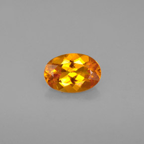 Clinohumite naturale arancione da 0,67 ct, taglio ovale, VS