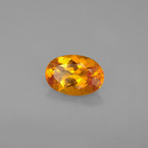 Clinohumite naturale arancione da 0,67 ct, taglio ovale, VS
