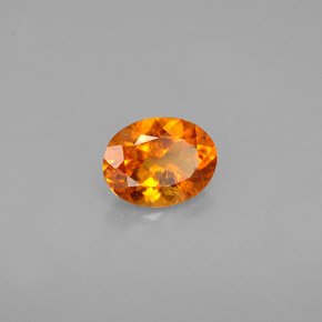 Clinoumite Giallo-arancione naturale da 0.60 ct, Taglio ovale, VS-SI