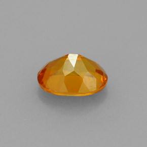 Clinoumite Giallo-arancione naturale da 0.75 ct, Taglio ovale, VS