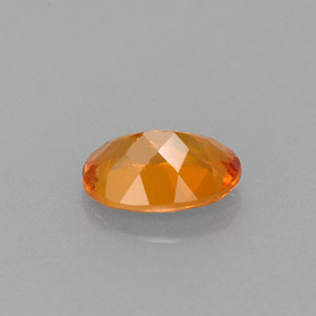 Clinoumite Giallo-arancione naturale da 0.66 ct, Taglio ovale, VS-SI
