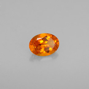 Clinoumite Giallo-arancione naturale da 0.50 ct, Taglio ovale, VS