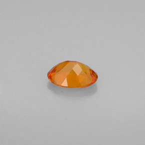 Clinoumite Giallo-arancione naturale da 0.50 ct, Taglio ovale, VS