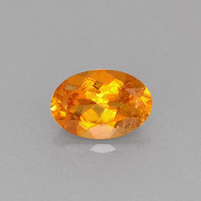 Clinohumite naturale arancione da 0,61 ct, taglio ovale, VS-SI