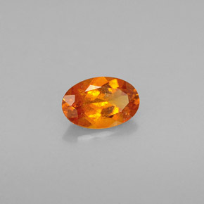 Clinoumite Giallo-arancione naturale da 0.54 ct, Taglio ovale, VS-SI