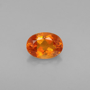 Clinoumite Giallo-arancione naturale da 0.64 ct, Taglio ovale, VS-SI