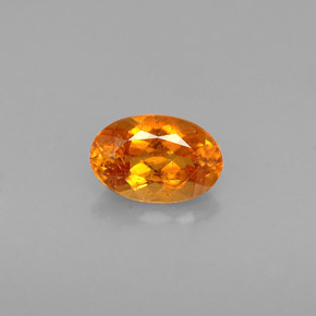 Clinoumite Giallo-arancione naturale da 0.64 ct, Taglio ovale, VS-SI