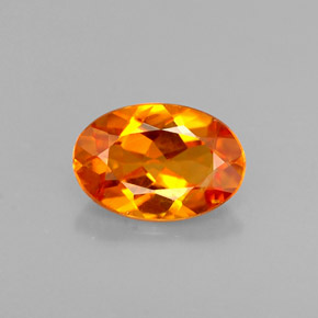 Clinohumite naturale arancione da 0,58 ct, taglio ovale, VS
