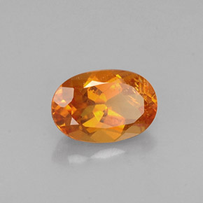 Clinoumite Giallo-arancione naturale da 0.60 ct, Taglio ovale, VS-SI