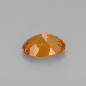 Clinoumite Giallo-arancione naturale da 0.60 ct, Taglio ovale, VS-SI