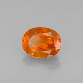Clinohumite naturale arancione da 0,72 ct, taglio ovale, VS-SI