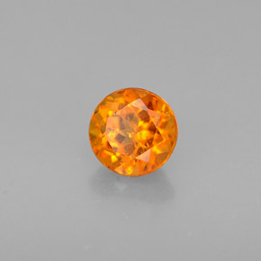 Clinoumite Giallo-arancione naturale da 0.46 ct, Taglio rotondo, VS