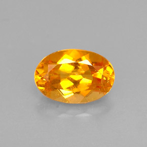 Clinohumite naturale arancione da 0,52 ct, taglio ovale, VS