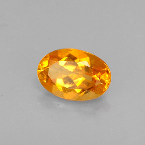 Clinohumite naturale arancione da 0,52 ct, taglio ovale, VS