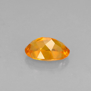 Clinohumite naturale arancione da 0,52 ct, taglio ovale, VS