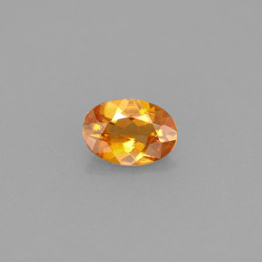 Clinohumite naturale arancione da 0,42 ct, taglio ovale, VS