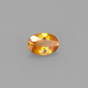 Clinohumite naturale arancione da 0,42 ct, taglio ovale, VS