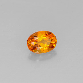 Clinohumite naturale arancione da 0,44 ct, taglio ovale, VS