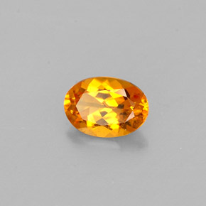Clinoumite Giallo-arancione naturale da 0,47 ct, Taglio ovale, VS