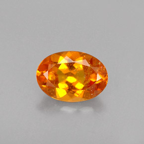 Clinoumite Giallo-arancione naturale da 0.46 ct, Taglio ovale, VS-SI