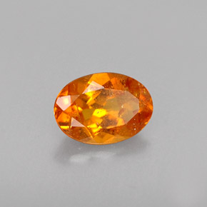 Clinoumite Giallo-arancione naturale da 0.46 ct, Taglio ovale, VS-SI