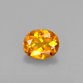 Clinoumite Giallo-arancione naturale da 0.41 ct, Taglio ovale, VS