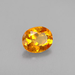 Clinoumite Giallo-arancione naturale da 0.41 ct, Taglio ovale, VS