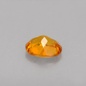 Clinoumite Giallo-arancione naturale da 0.41 ct, Taglio ovale, VS