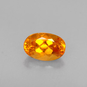 Clinohumite naturale arancione da 0,47 ct, taglio ovale, VS-SI